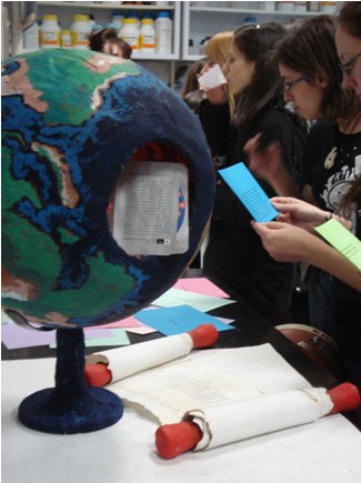 Students surrounding globe