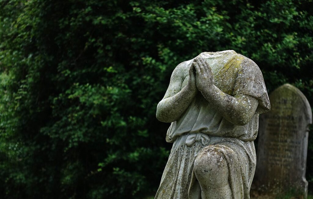 statue effigy headless memorial goth garden